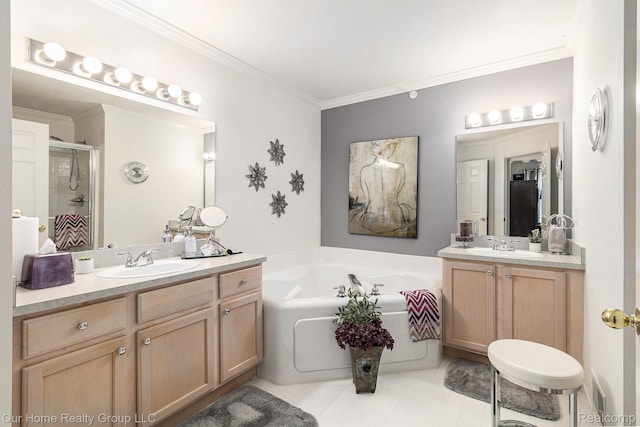 3994 Forester Blvd, Auburn Hills, MI 48326 - full bathroom with two vanities, a stall shower, a garden tub, crown molding, and tile patterned floors
