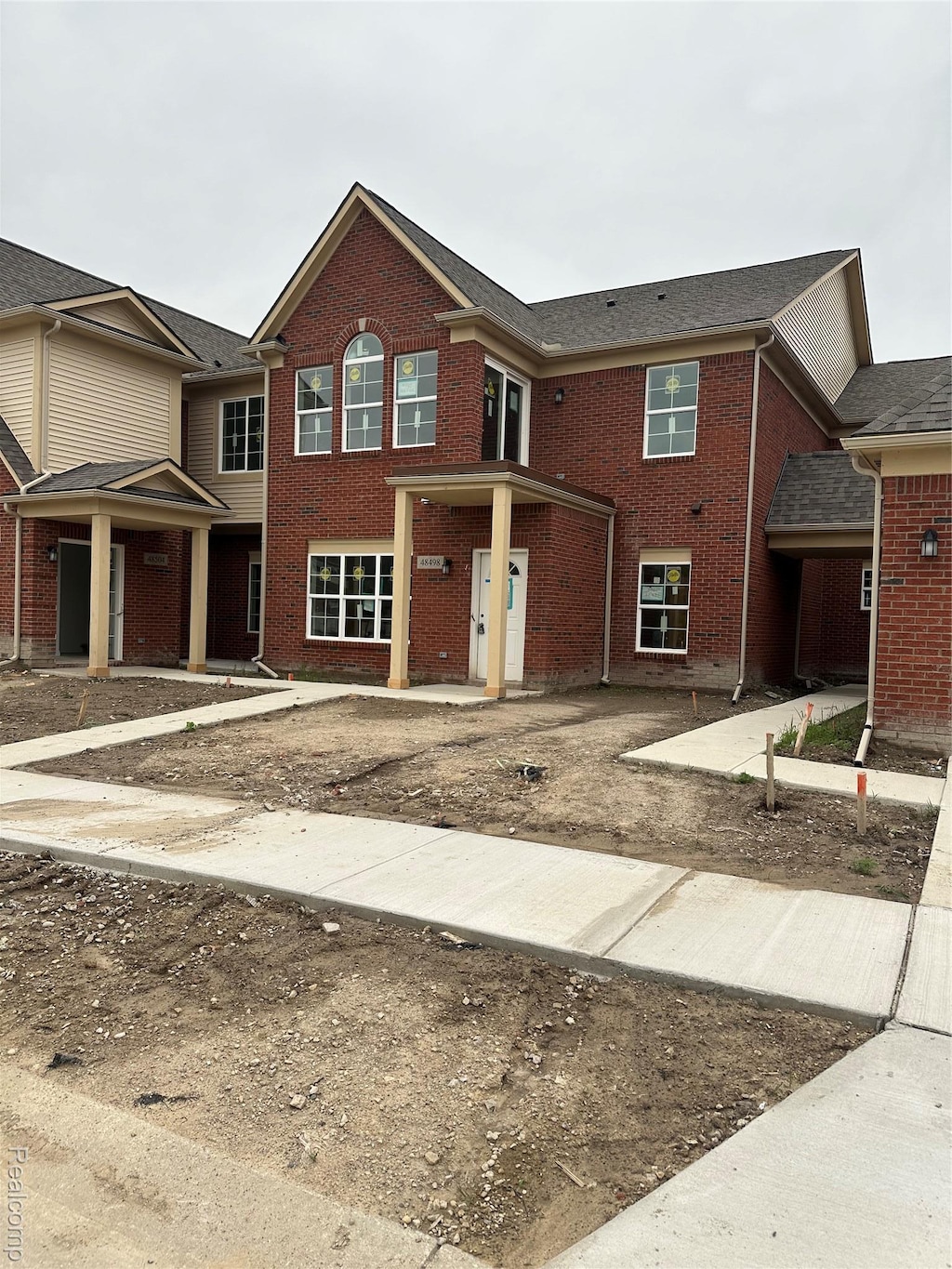 48480 Bridge Way Unit 570, Canton, MI 48188 - traditional-style house with brick siding