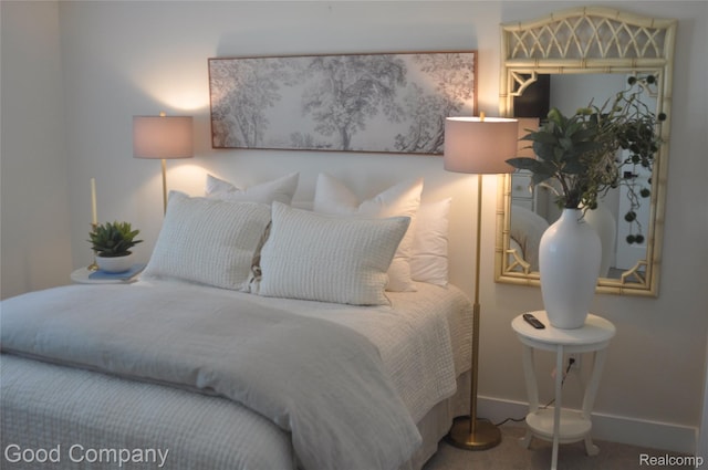 1530 Parmenter Ct Unit 18, Petoskey, MI 49770 - carpeted bedroom featuring baseboards