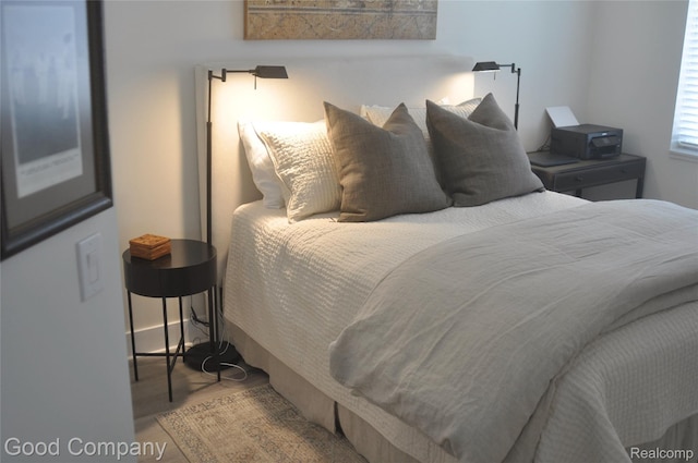 1530 Parmenter Ct Unit 18, Petoskey, MI 49770 - bedroom featuring wood finished floors