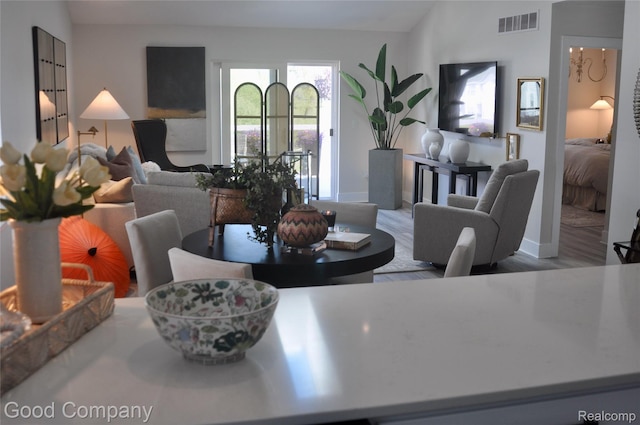 1530 Parmenter Ct Unit 18, Petoskey, MI 49770 - dining area featuring wood finished floors and lofted ceiling