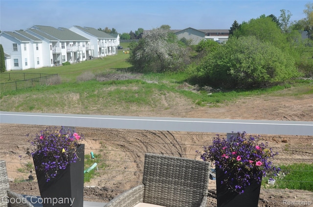 1530 Parmenter Ct Unit 18, Petoskey, MI 49770 - view of yard featuring a residential view