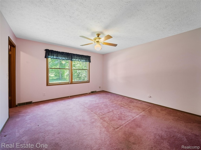 3225 W Marr Rd, Howell, MI 48855 - carpeted empty room featuring a ceiling fan and a textured ceiling