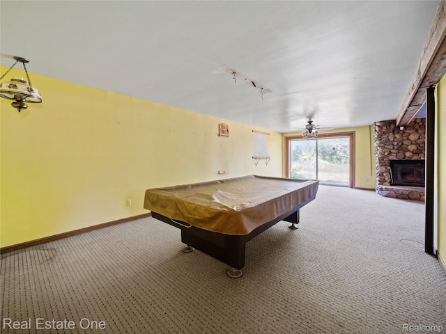 3225 W Marr Rd, Howell, MI 48855 - playroom featuring carpet flooring, a stone fireplace, and ceiling fan