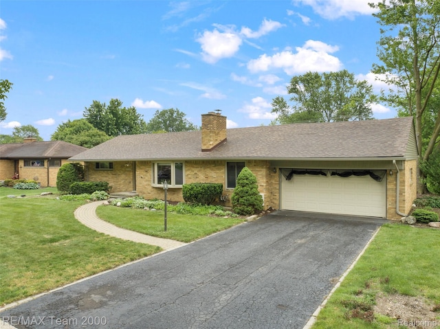 30695 Lyndon St, Livonia, MI 48154 - single story home featuring driveway, a garage, brick siding, and a front yard