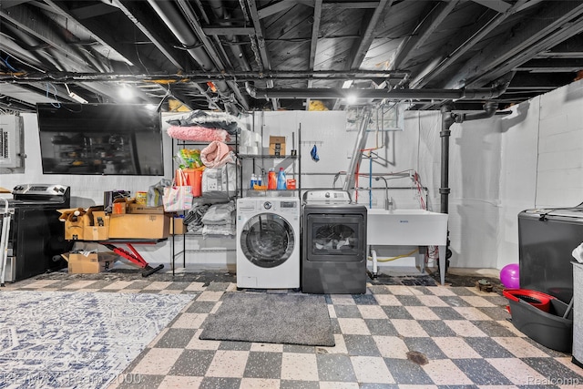 30695 Lyndon St, Livonia, MI 48154 - unfinished basement with washing machine and dryer and tile patterned floors