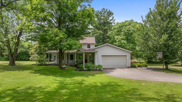 9719 King Rd, Spring Arbor, MI 49283 - view of front of home featuring a front yard, asphalt driveway, a garage, and a shingled roof