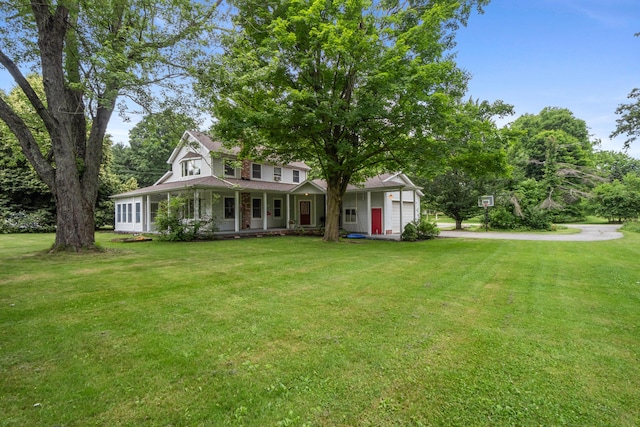 9719 King Rd, Spring Arbor, MI 49283 - view of front of property featuring a front yard, a porch, and an attached garage
