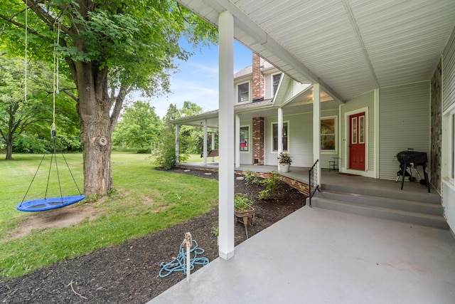 9719 King Rd, Spring Arbor, MI 49283 - porch featuring a lawn and grilling area