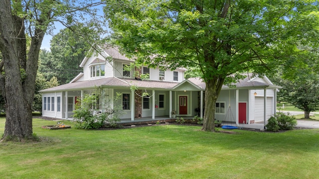 9719 King Rd, Spring Arbor, MI 49283 - view of front of house with an attached garage, covered porch, a front lawn, and roof with shingles