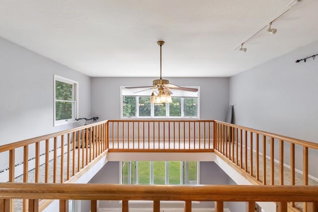 9719 King Rd, Spring Arbor, MI 49283 - hallway featuring track lighting