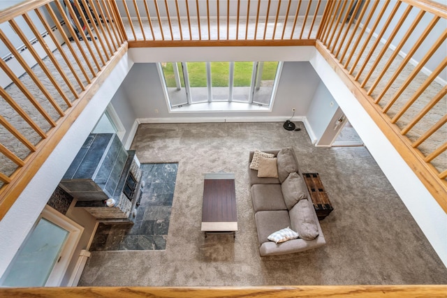 9719 King Rd, Spring Arbor, MI 49283 - unfurnished living room with stairway and carpet flooring