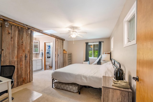 9719 King Rd, Spring Arbor, MI 49283 - carpeted bedroom featuring ensuite bathroom and ceiling fan