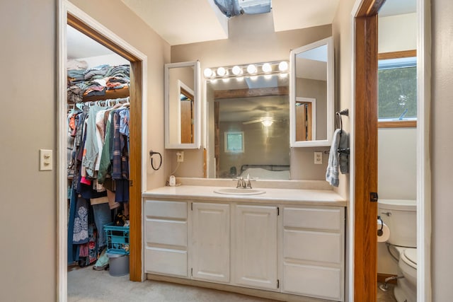 9719 King Rd, Spring Arbor, MI 49283 - bathroom featuring vanity and a spacious closet