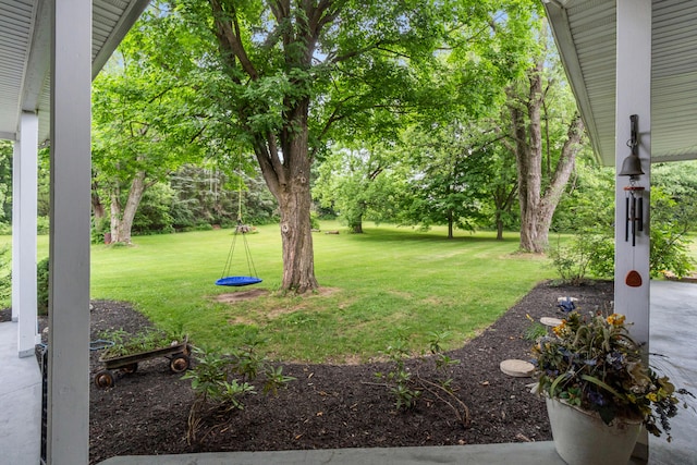 9719 King Rd, Spring Arbor, MI 49283 - view of green lawn with view of wooded area