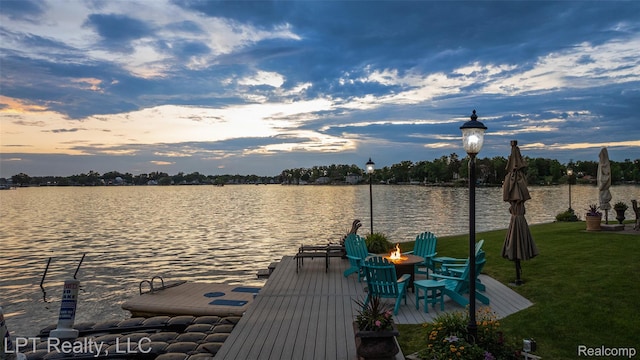 328 S Broadway St, Lake Orion, MI 48362 - dock area featuring a water view, a lawn, and an outdoor fire pit