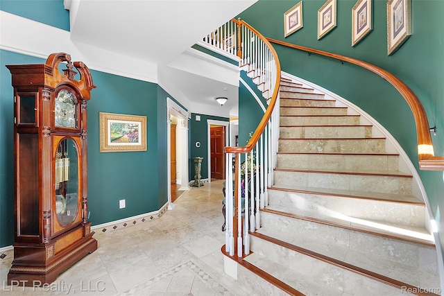 328 S Broadway St, Lake Orion, MI 48362 - stairs featuring baseboards