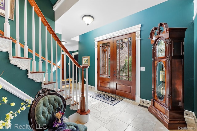 328 S Broadway St, Lake Orion, MI 48362 - entryway featuring stairway, french doors, and tile patterned floors