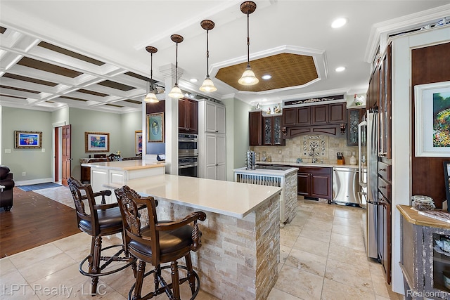 328 S Broadway St, Lake Orion, MI 48362 - kitchen with stainless steel appliances, light countertops, decorative backsplash, crown molding, and recessed lighting