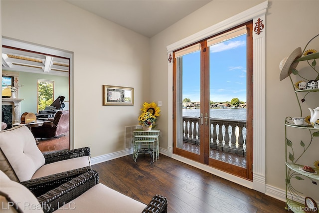 328 S Broadway St, Lake Orion, MI 48362 - sitting room with dark wood-type flooring, coffered ceiling, a premium fireplace, a water view, and beam ceiling