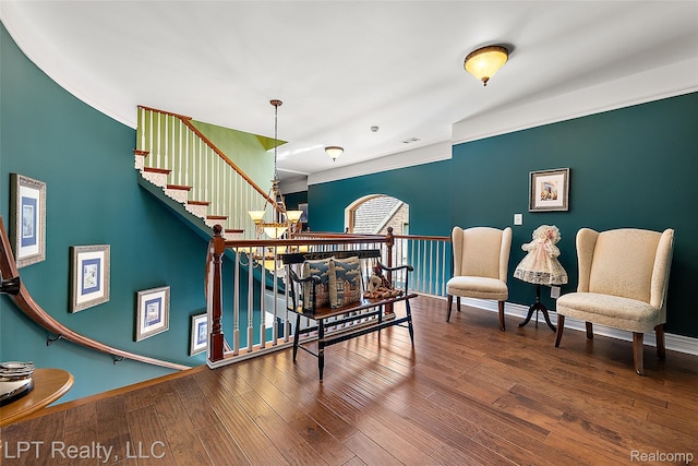 328 S Broadway St, Lake Orion, MI 48362 - stairs with baseboards and wood finished floors
