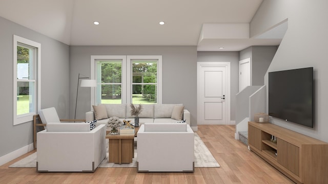 2848 Ruby St, Traverse City, MI 49684 - living room with healthy amount of natural light, light wood-type flooring, recessed lighting, and vaulted ceiling