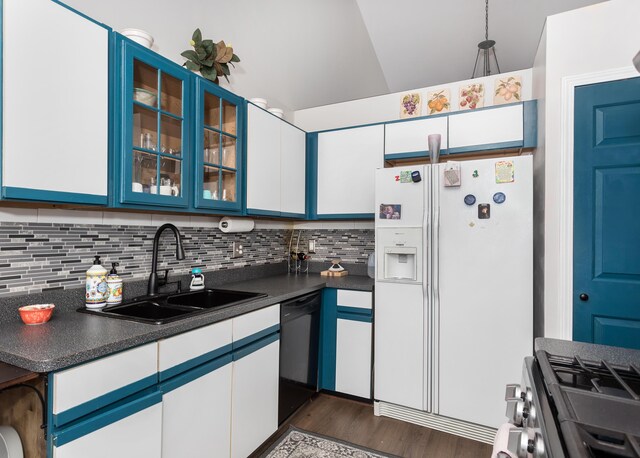 30921 Lee Frank Ln, Madison Heights, MI 48071 - kitchen with white fridge with ice dispenser, dishwasher, dark countertops, backsplash, and dark wood-type flooring