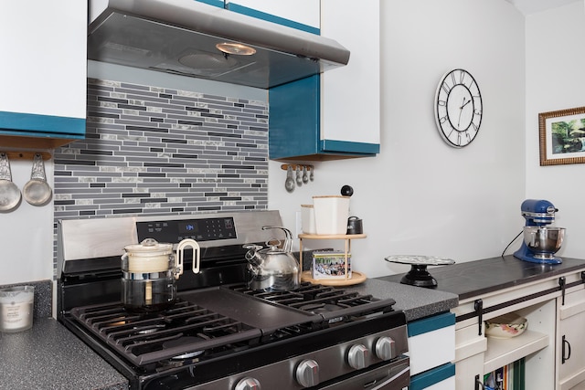 30921 Lee Frank Ln, Madison Heights, MI 48071 - kitchen with stainless steel gas range, decorative backsplash, and ventilation hood
