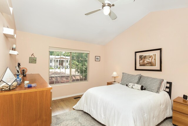 30921 Lee Frank Ln, Madison Heights, MI 48071 - bedroom with vaulted ceiling, wood finished floors, and a ceiling fan