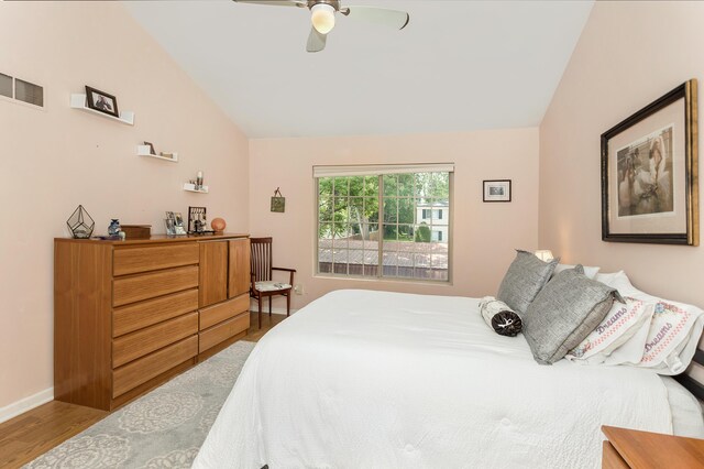 30921 Lee Frank Ln, Madison Heights, MI 48071 - bedroom featuring vaulted ceiling, wood finished floors, and a ceiling fan