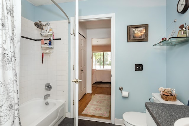 30921 Lee Frank Ln, Madison Heights, MI 48071 - bathroom with shower / tub combo with curtain, vanity, ensuite bath, and wood finished floors