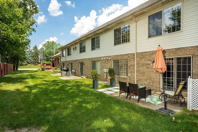 30921 Lee Frank Ln, Madison Heights, MI 48071 - back of house with brick siding and a patio