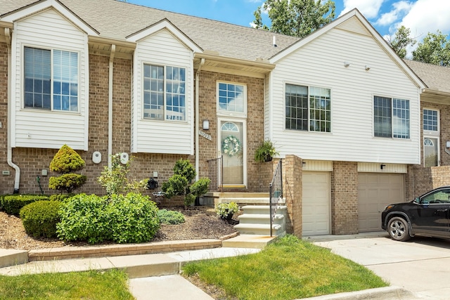 30921 Lee Frank Ln, Madison Heights, MI 48071 - multi unit property featuring brick siding, driveway, a garage, and roof with shingles