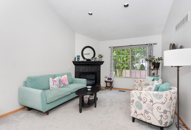 30921 Lee Frank Ln, Madison Heights, MI 48071 - carpeted living area featuring a high end fireplace and lofted ceiling