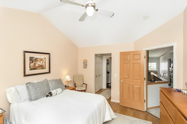 30921 Lee Frank Ln, Madison Heights, MI 48071 - bedroom with vaulted ceiling, light wood-style floors, a ceiling fan, and a closet