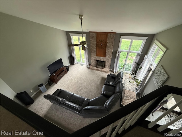 14607 Stratford, Shelby Twp, MI 48315 - carpeted living area featuring a brick fireplace and baseboards