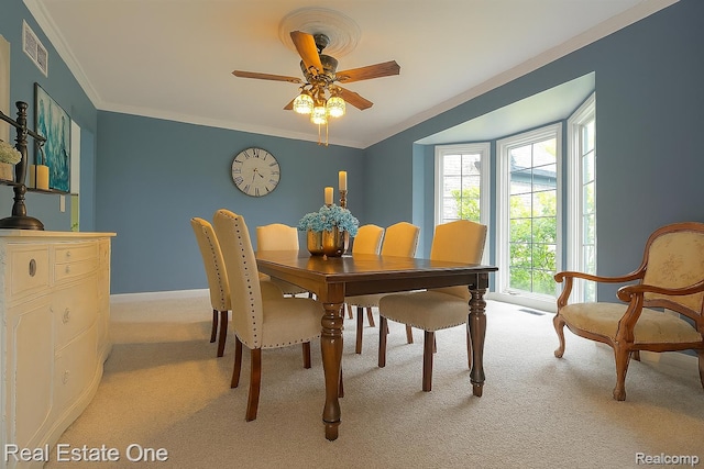 14607 Stratford, Shelby Twp, MI 48315 - dining area featuring light colored carpet, crown molding, and ceiling fan