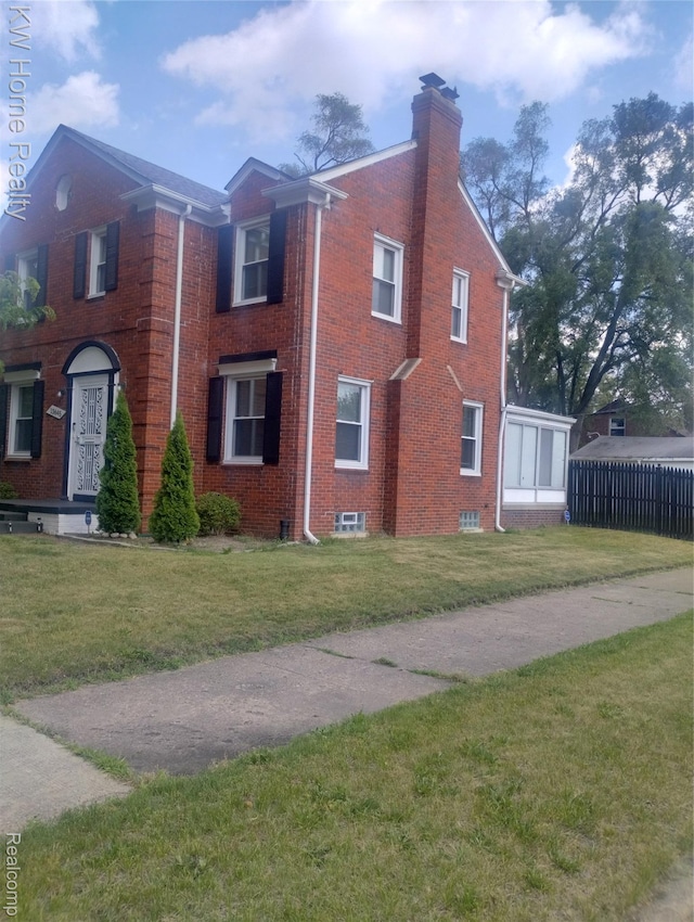 13645 Vassar Ave, Detroit, MI 48235 - view of home's exterior with brick siding and a chimney