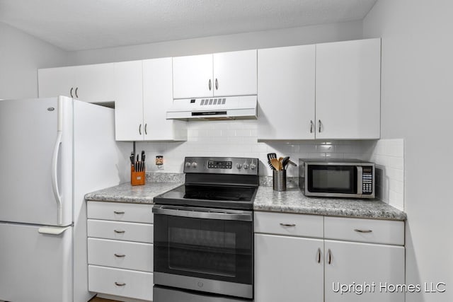 2685 Hillandale Dr NW, Walker, MI 49534 - kitchen featuring stainless steel appliances, custom exhaust hood, decorative backsplash, and white cabinets