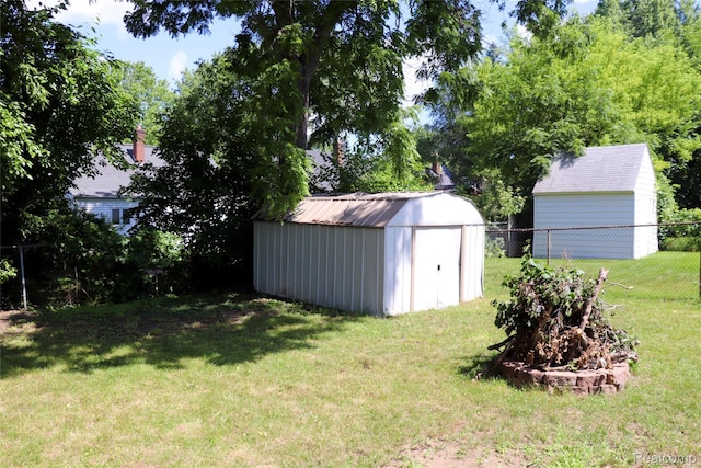 329 Bede St, Otisville, MI 48507 - view of yard with a shed
