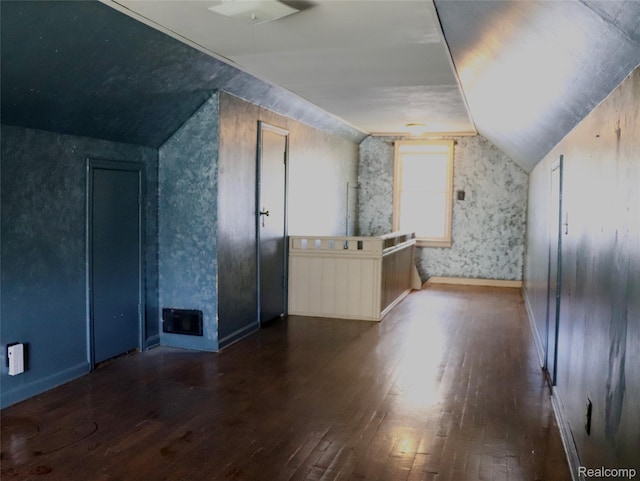 329 Bede St, Otisville, MI 48507 - bonus room with lofted ceiling, wood-type flooring, wallpapered walls, and a fireplace