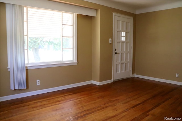 329 Bede St, Otisville, MI 48507 - foyer entrance with wood finished floors and baseboards