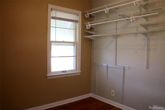 329 Bede St, Otisville, MI 48507 - spacious closet featuring dark wood-style floors