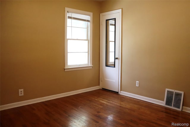329 Bede St, Otisville, MI 48507 - unfurnished room with plenty of natural light and dark wood-type flooring
