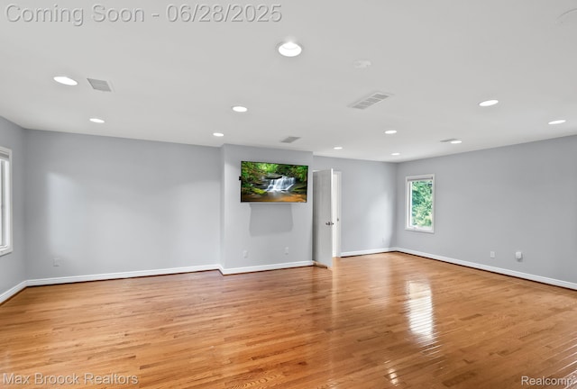 6847 Alden Dr, West Bloomfield, MI 48324 - spare room with recessed lighting and wood finished floors