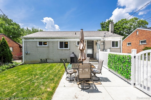 32204 Leelane, Farmington, MI 48336 - rear view of house featuring a chimney, a patio area, and brick siding