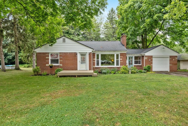 437 Collindale Ave NW, Grand Rapids, MI 49504 - ranch-style home featuring an attached garage, driveway, brick siding, a chimney, and a front yard