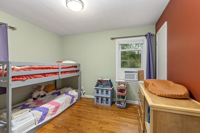 437 Collindale Ave NW, Grand Rapids, MI 49504 - bedroom featuring cooling unit and light wood-type flooring