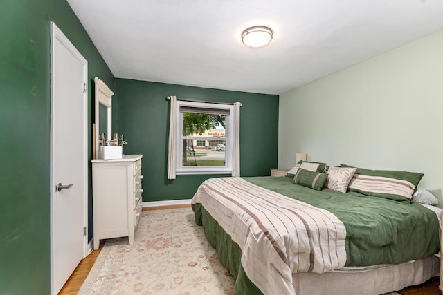 437 Collindale Ave NW, Grand Rapids, MI 49504 - bedroom with light wood finished floors and baseboards