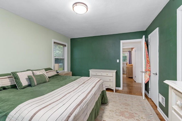 437 Collindale Ave NW, Grand Rapids, MI 49504 - bedroom with wood finished floors and baseboards
